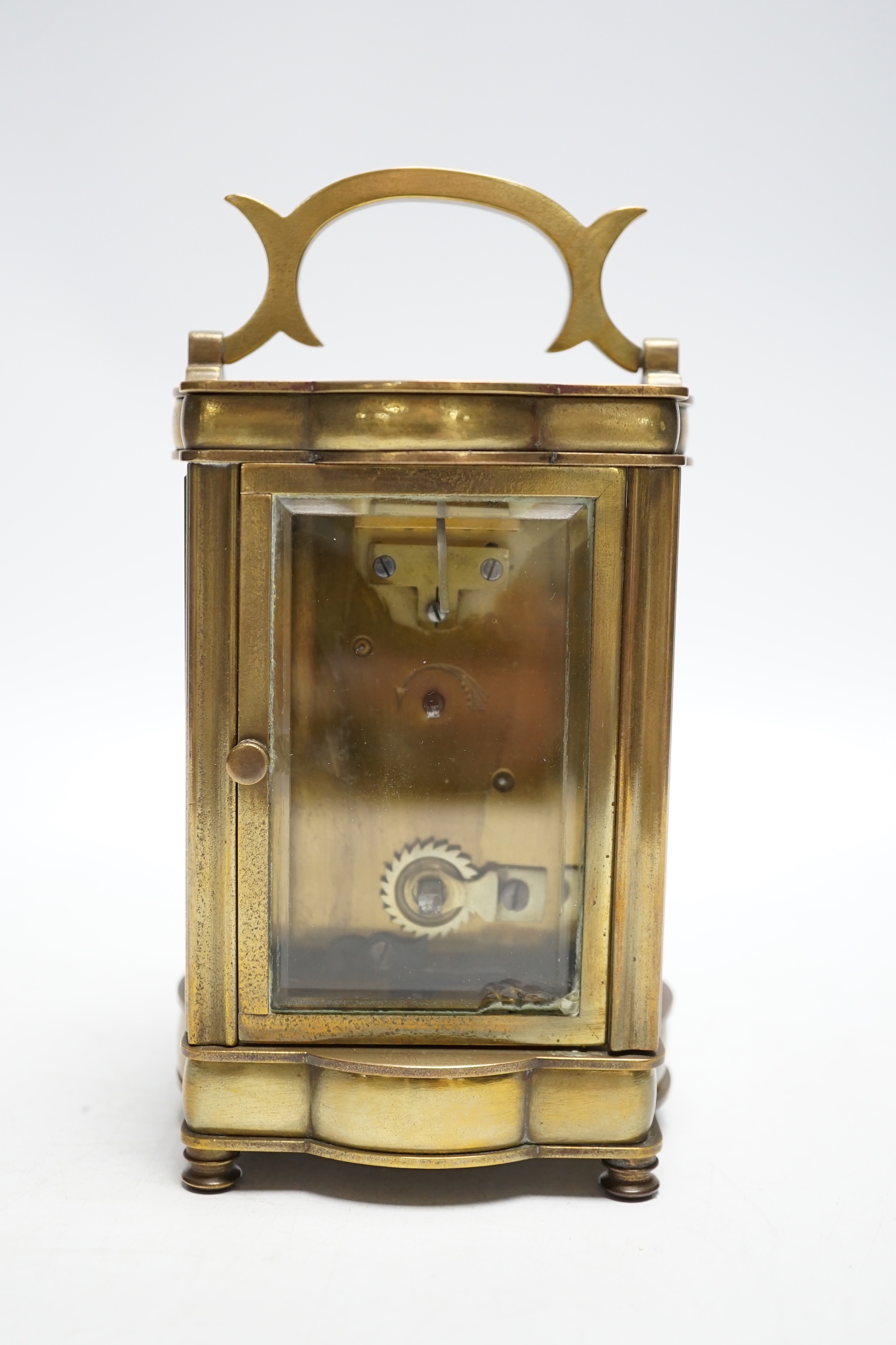 A brass cased carriage timepiece, 12cm